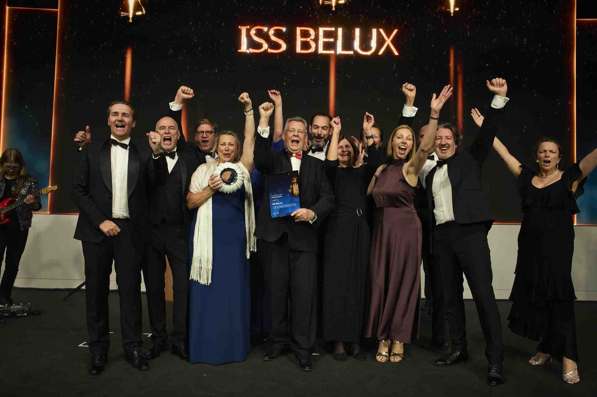 The leadership team of ISS BeLux cheering because of winning the global ISS People Award